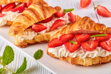 summer breakfast - croissant sandwiches, top view