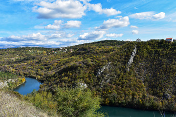 River canyon under the white clouds and beautiful sky/ river Cetina-Croatia