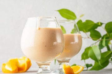 Two cocktail glass with smoothies milkshake healthy drink