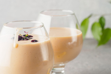 Two cocktail glass with smoothies milkshake healthy drink