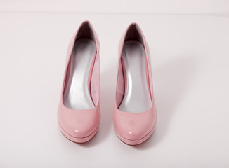 fashion female pink shoes with heels isolated.