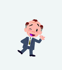 Old businessman doing the OK sign with his hand.