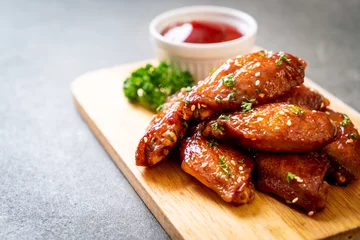 Foto op Canvas barbecue chicken wings with white sesame © topntp