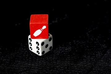 Red and White Dice on black background