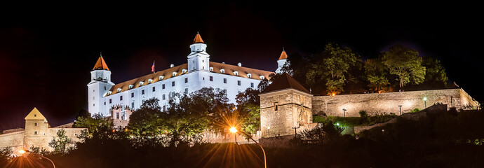 Naklejka premium Bratislava, Slovakia May 23, 2018: Bratislava Castle or Bratislavsky Hrad is the main castle of Bratislava, capital of Slovakia by night. Bratislava Castle is located on rocky hill.