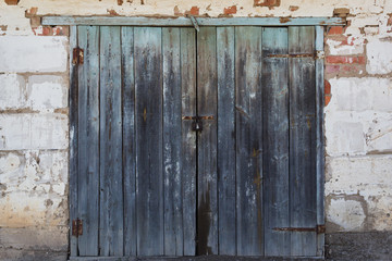 Vintage wood background with peeling grunge paint.