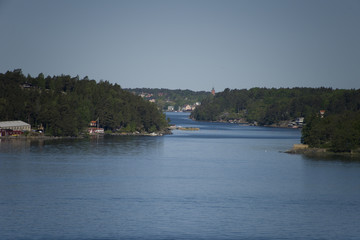 Islands in Stockholm archipelago, small town Vaxholm in the background