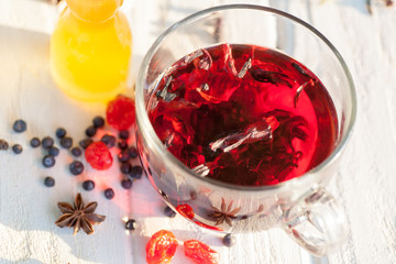 Red Hot Hibiscus tea in a glass mug