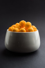 Kaddu or Pumpkin Kheer Or Bhoplyachi Kheer in Marathi and gummadikaya payasam in Telugu, Garnished with dry fruits. served in a bowl over moody background. Selective focus