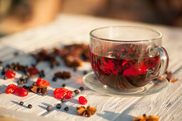 Red Hot Hibiscus tea in a glass mug