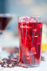 Red Hot Hibiscus tea in a glass mug