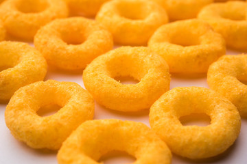 Kaju Katli is a Diamond shape Indian sweet made using cashew sugar and mava, served in a plate or bowl over moody background. selective focus