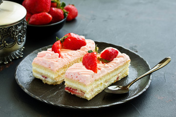 strawberry cake. dark background.