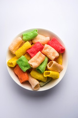 Basundi Or Rabri is an Indian sweet popular in Gujarat and Maharashtra. It is a sweetened condensed milk. Garnished with Dry fruits and Saffron. Served in a bowl over moody background. Selective focus