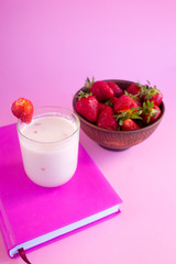 Strawberry milkshake in the glass jar
