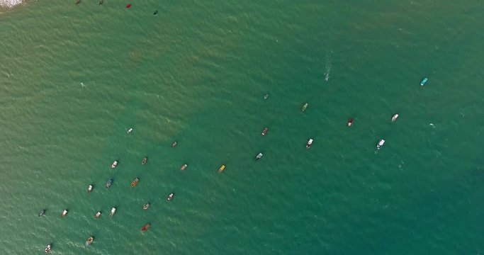 Aerial view of traditional fishing boat moored in the turquoise sea of Rio do Fogo, Brazil.