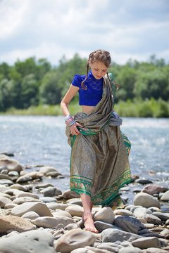 Little baby girl in traditional Indian Sari.