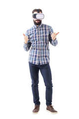Young smart casual business man with virtual reality glasses showing thumbs up gesture. Full body isolated on white background. 