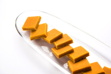 Delicious Indian street corn cob also called Bhutta, flavoured with spicy chilli, butter etc. Selective focus