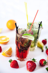 Tradition Summer drink mojito with lime and mint, strawberries