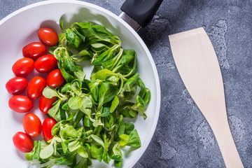 Fresh vegetables in white ceramic pan