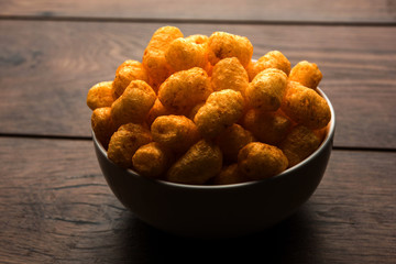 Kaddu or Pumpkin Kheer Or Bhoplyachi Kheer in Marathi and gummadikaya payasam in Telugu, Garnished with dry fruits. served in a bowl over moody background. Selective focus