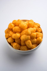 Kaju Katli is a Diamond shape Indian sweet made using cashew sugar and mava, served in a plate or bowl over moody background. selective focus