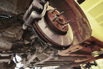 Disc brakes. assembly on a modern automobile - Brake work in progress. toning