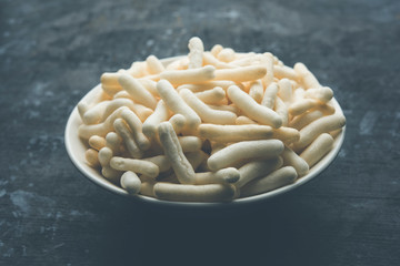 Kaddu or Pumpkin Kheer Or Bhoplyachi Kheer in Marathi and gummadikaya payasam in Telugu, Garnished with dry fruits. served in a bowl over moody background. Selective focus