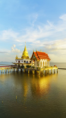 Fototapeta na wymiar Beautiful Wat Hong Thong located in a mangrove forest area , magnificient temple on the sea , Bang Pakong District, Chachoengsao ,Thailand