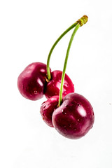 Ripe raw organic cherry, isolated on white background
