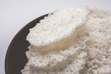 Basundi Or Rabri is an Indian sweet popular in Gujarat and Maharashtra. It is a sweetened condensed milk. Garnished with Dry fruits and Saffron. Served in a bowl over moody background. Selective focus