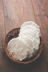 Basundi Or Rabri is an Indian sweet popular in Gujarat and Maharashtra. It is a sweetened condensed milk. Garnished with Dry fruits and Saffron. Served in a bowl over moody background. Selective focus