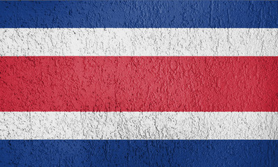 Texture of the Costa Rica  flag on a white wall of plaster.