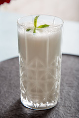 Ayran - liquid drink made from yogurt in ransparent glass cup
