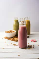 Basundi Or Rabri is an Indian sweet popular in Gujarat and Maharashtra. It is a sweetened condensed milk. Garnished with Dry fruits and Saffron. Served in a bowl over moody background. Selective focus