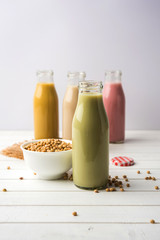Basundi Or Rabri is an Indian sweet popular in Gujarat and Maharashtra. It is a sweetened condensed milk. Garnished with Dry fruits and Saffron. Served in a bowl over moody background. Selective focus