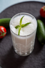 Ayran - liquid drink made from yogurt in ransparent glass cup