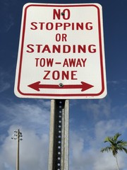 Tow-away zone sign