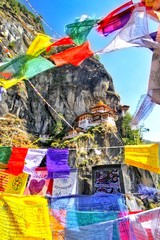 Colorful Buddhist prayer flags at Taktshang Goemba or Tiger's nest monastery in Paro, Bhutan