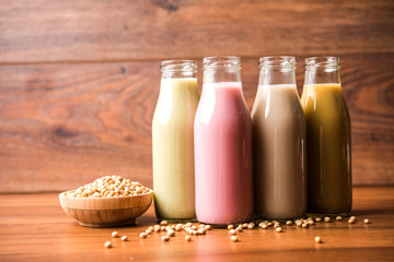 Basundi Or Rabri is an Indian sweet popular in Gujarat and Maharashtra. It is a sweetened condensed milk. Garnished with Dry fruits and Saffron. Served in a bowl over moody background. Selective focus
