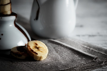Banana slices with chocolate.