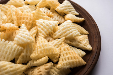 Basundi Or Rabri is an Indian sweet popular in Gujarat and Maharashtra. It is a sweetened condensed milk. Garnished with Dry fruits and Saffron. Served in a bowl over moody background. Selective focus