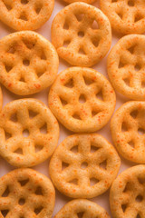 Kaju Katli is a Diamond shape Indian sweet made using cashew sugar and mava, served in a plate or bowl over moody background. selective focus
