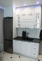 classic kitchen in white with mirrors
