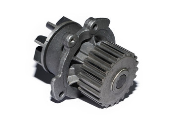 detail for the repair of a machine, a product with a gear of metal, a spare part on a white background,