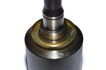 detail for the repair of a machine, a product made of metal, a spare part on a white background,