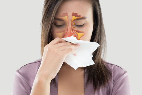 Women feeling unwell and sinus on gray background