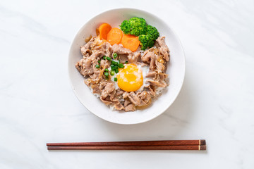 donburi, pork rice bowl with onsen egg and vegetable