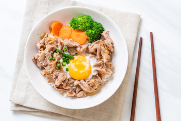 donburi, pork rice bowl with onsen egg and vegetable